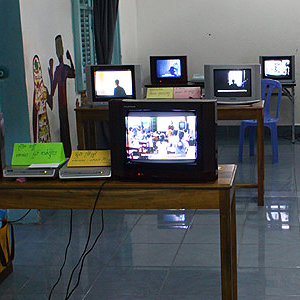 A community classroom was converted into a multi-channel video installatoin by Sa Sa Art Projects' students during Snit Snaal (2012). Some of the TVs were borrowed from the White Building residents.